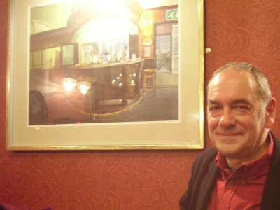 Mick Smee with his painting at the Royal Oak