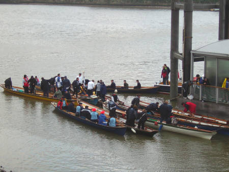 Participants in the Thames Cutters barge race dise