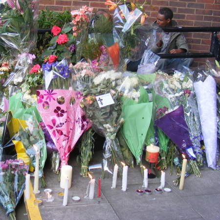 Flowers and candles outside Matheson Lang Gardens