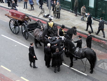 Funeral for unknown man as bodies dug up for rail viaduct are reburied