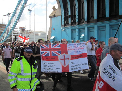 English Defence League supporters march across Tower Bridge