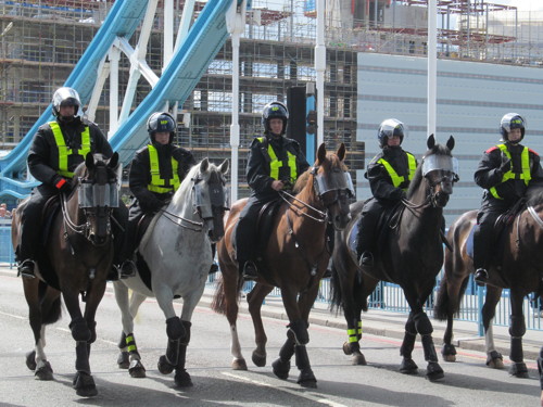 English Defence League supporters march across Tower Bridge