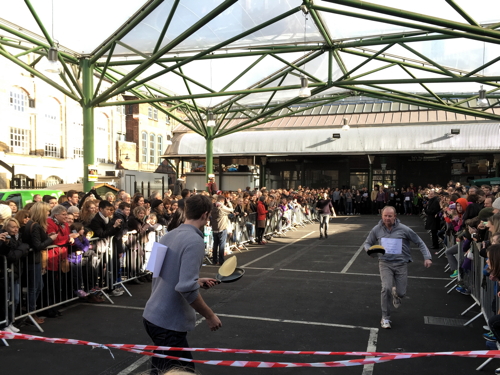 Local firms compete in pancake races at Borough Market and More London