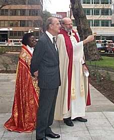 John Paxton explains to the Duke the plans for the restoration of the churchyard