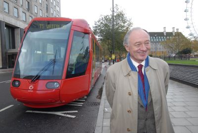 The Mayor of London poses with a mock-up tram in B