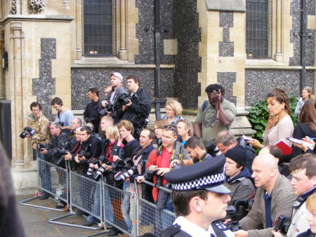 Photographers jostle for position in the cathedral