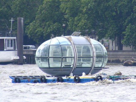 London Eye capsule floats down the Thames