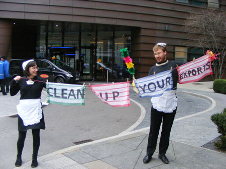 Campaigners dressed as maids confront delegates at Tooley Street trade summit