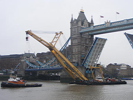 Giant crane lifts HMS Belfast’s collapsed gangway out of the river