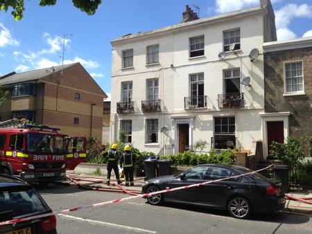 Hercules Road shut as firefighters tackle house fire