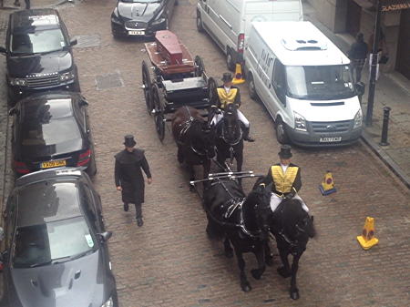 Funeral for unknown man as bodies dug up for rail viaduct are reburied