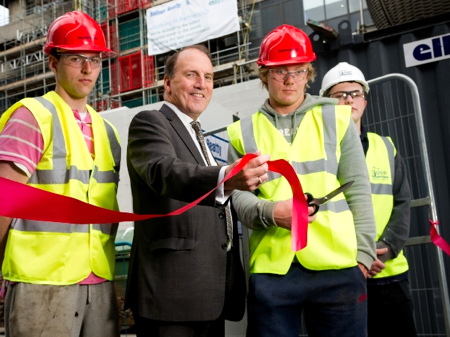 Simon Hughes cuts ribbon as Guy’s Tower cladding work begins in earnest