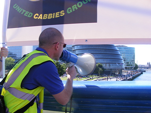 Taxi drivers hold Olympics protest on Tower Bridge