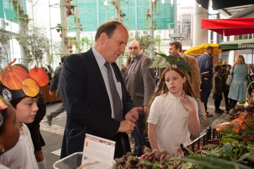 Young traders sell their harvest produce at Borough Market