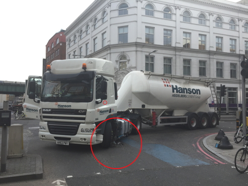 Cyclist escapes with minor injuries as bike is crushed by lorry