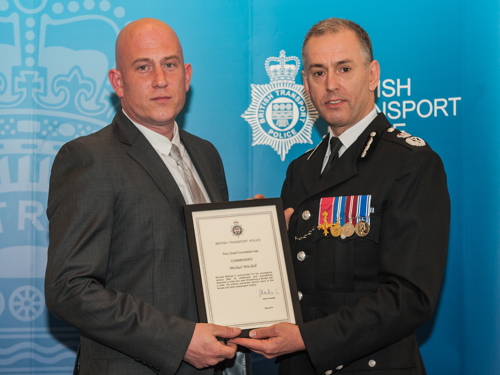 Commendation for ticket inspector who disarmed knife-wielding man