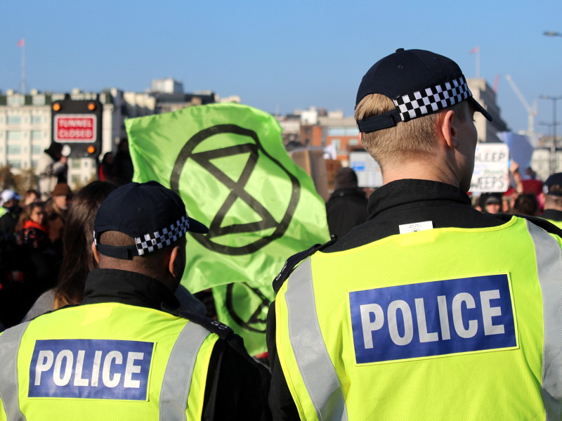 Environmental protesters block five Thames bridges