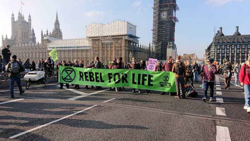 Environmental protesters block five Thames bridges