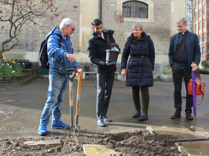 Parks minister visits Waterloo community garden project